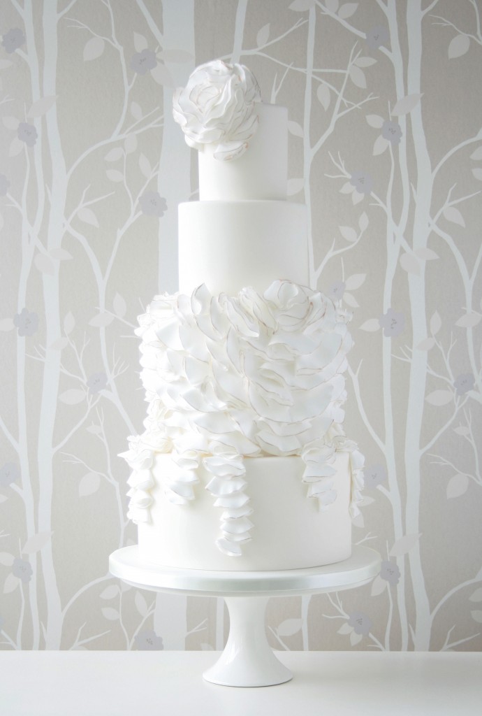 Folded ruffles white wedding cake