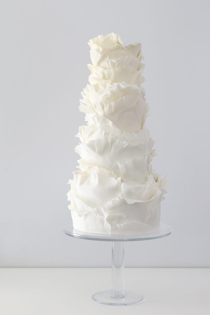 torn paper ruffles wedding cake